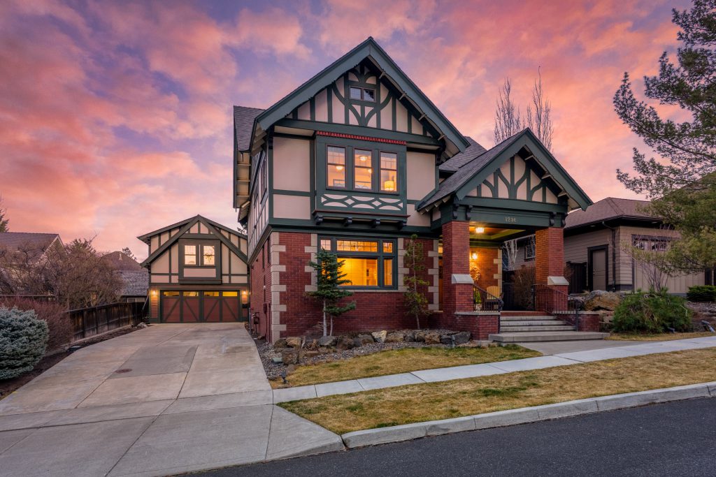 Twilight Tudor-style home in Bend, Oregon — Central Oregon real estate photography by Wasim